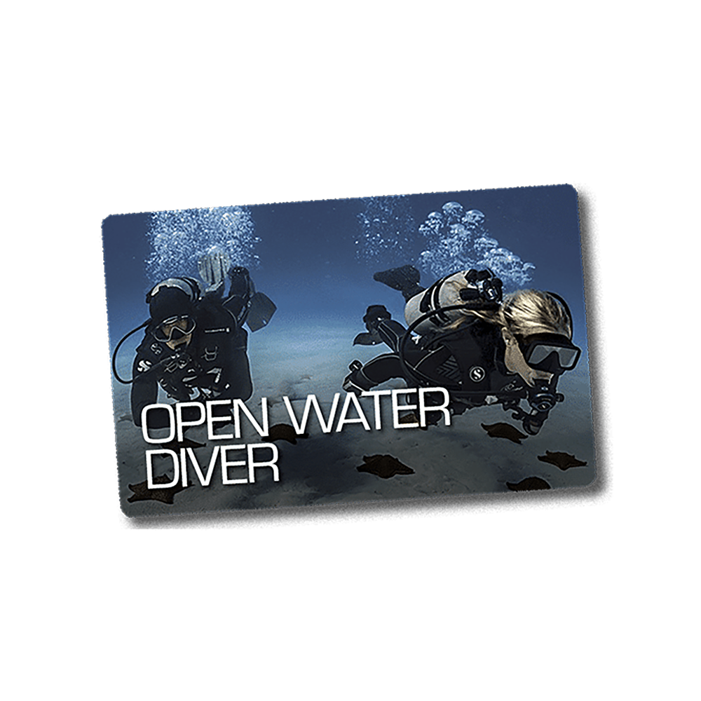 Diving certification card with two divers underwater and 'Open Water Diver' text.