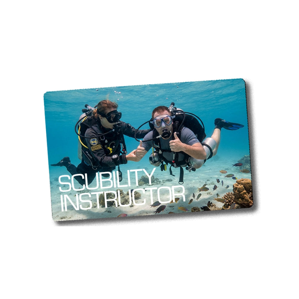 Two scuba divers underwater with 'Scubility Instructor' text overlay