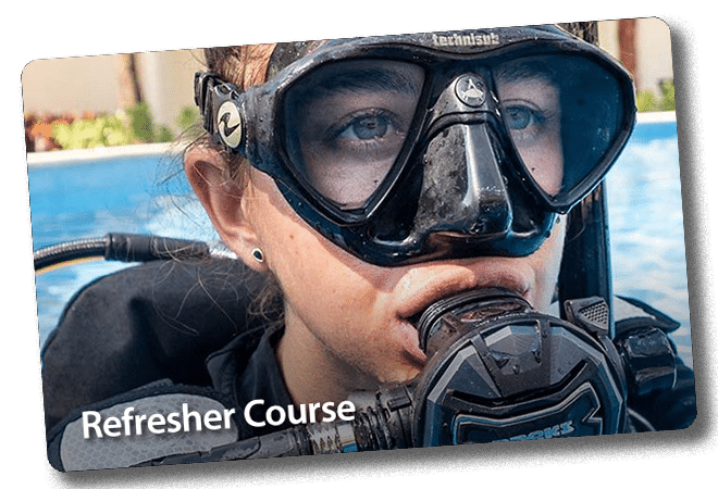 Person wearing scuba diving gear with 'Refresher Course' text overlay.